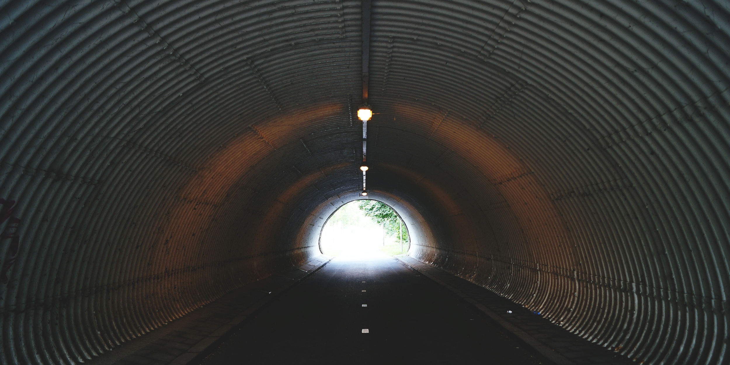 dark tunnel with light at the end