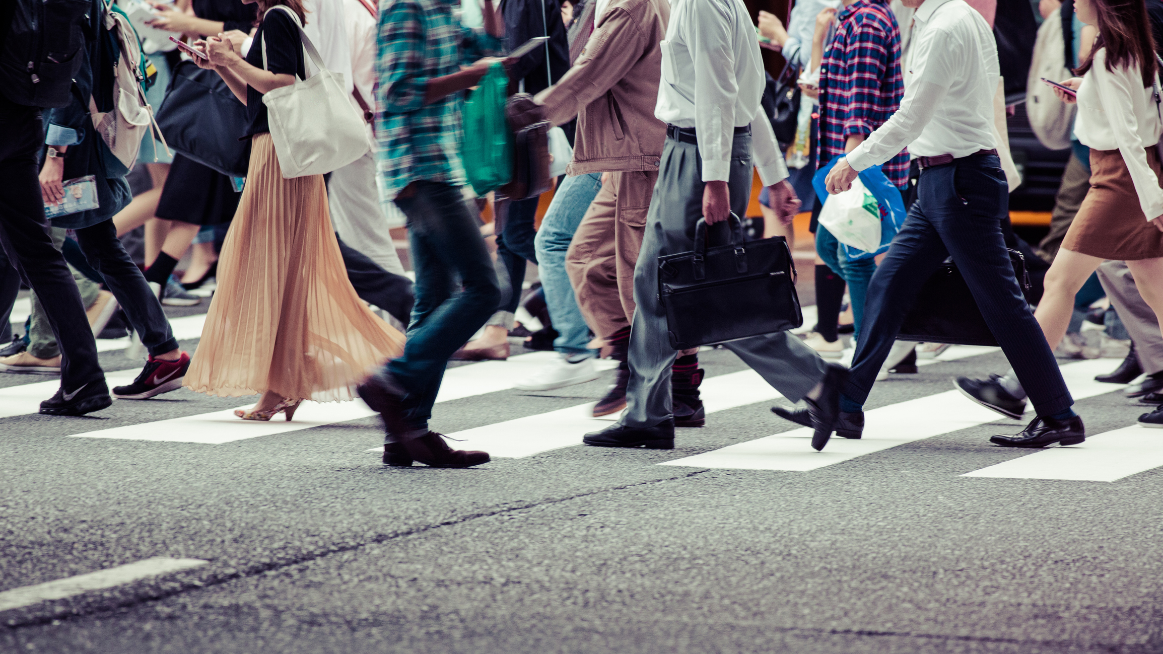 people crossing an intersection