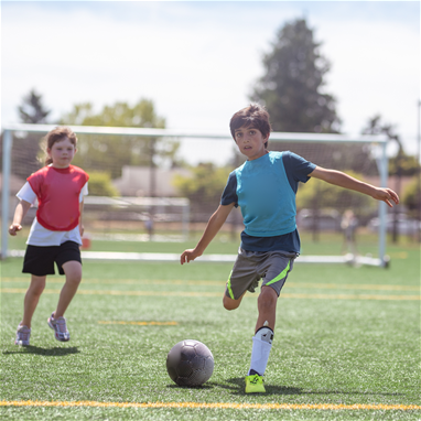 BCG Ottawa 2 children playing soccer