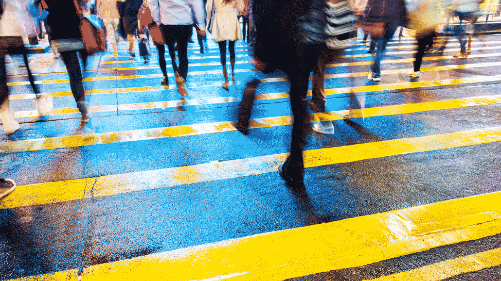 people crossing a street