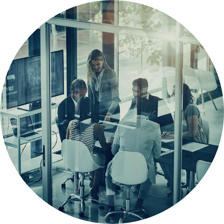 Group of employees having a meeting in a boardroom