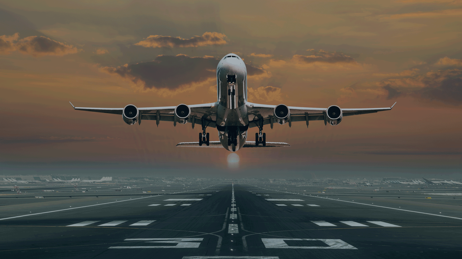 Airplane on runway taking off