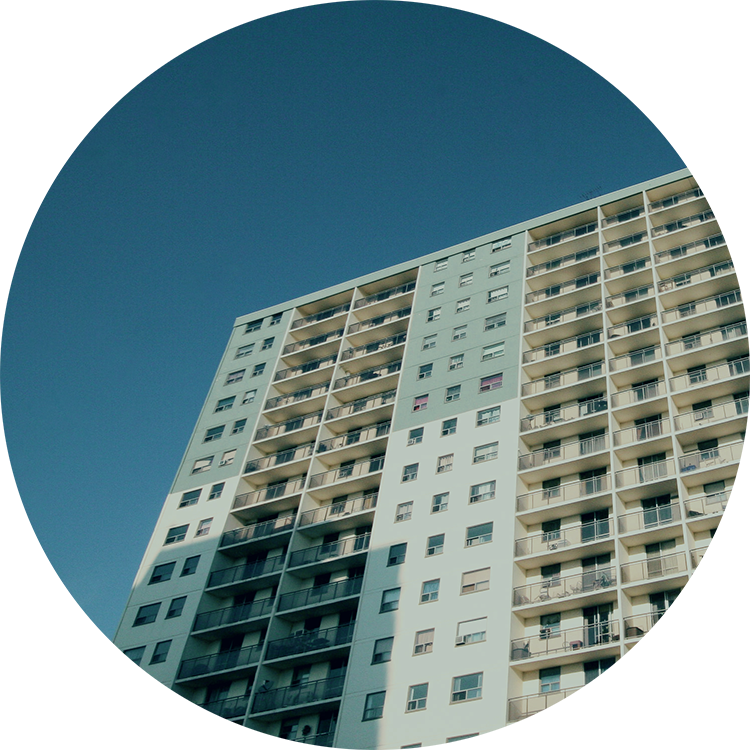 Private Real Estate Investing View from the ground of an apartment building